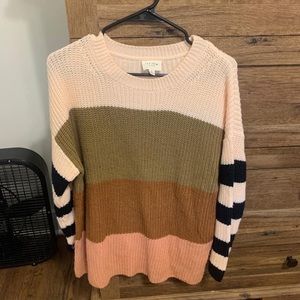 These three boutique sweater